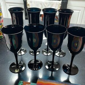 Champagne flutes (4) and 4 Wine glasses.